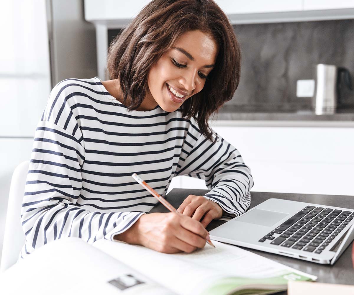 Person making notes on paper