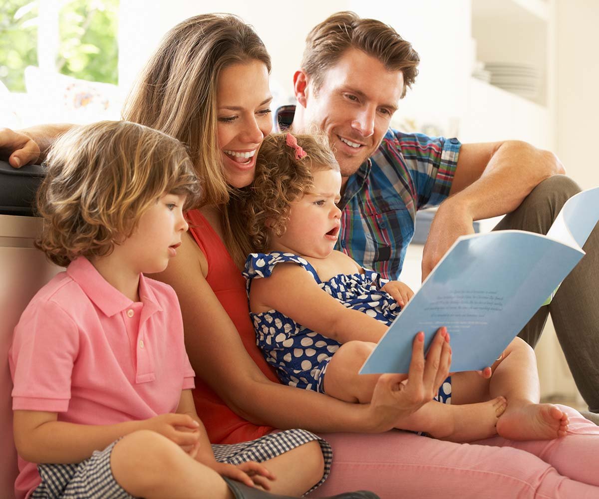 Happy family reading