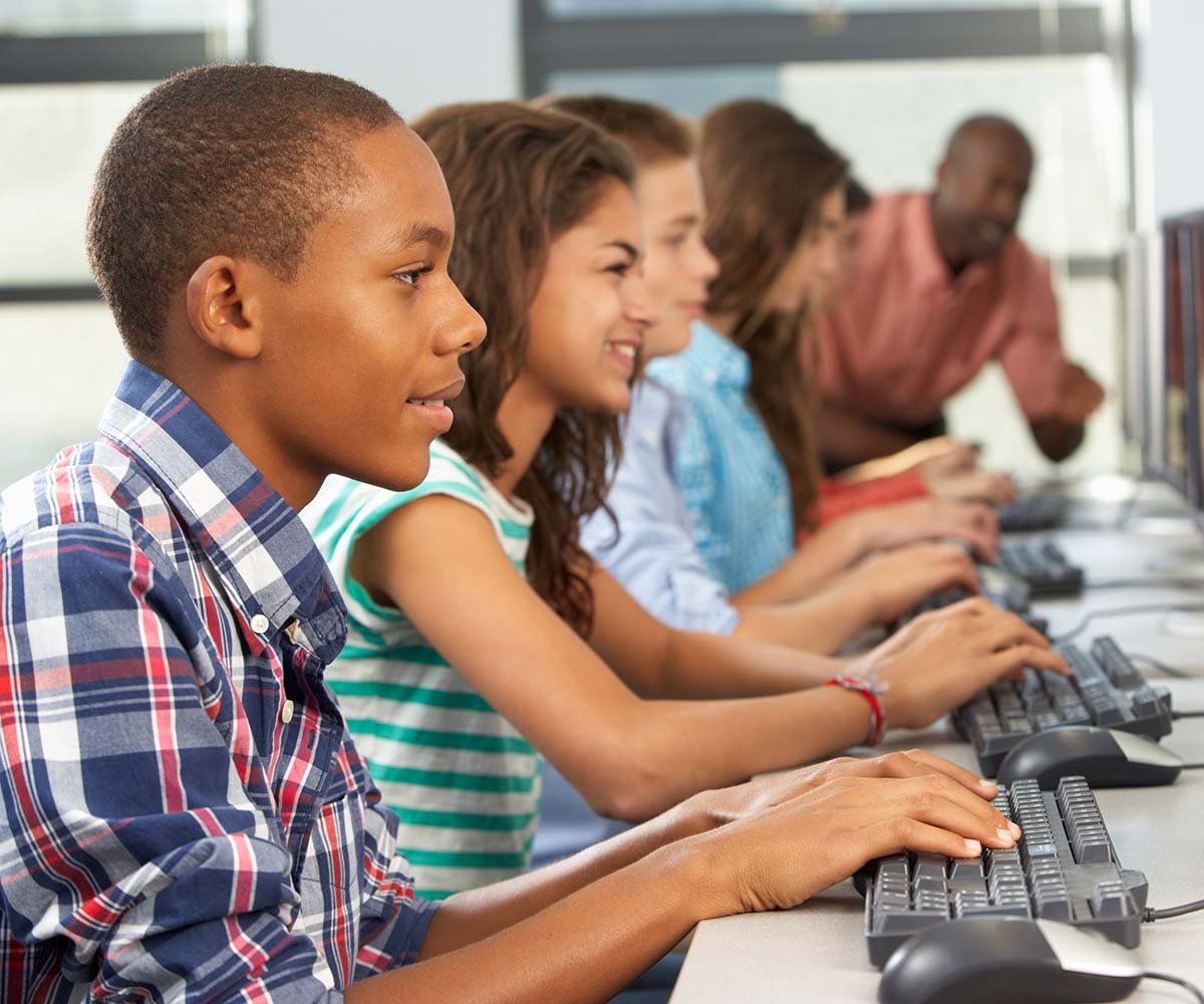 School children working on computers