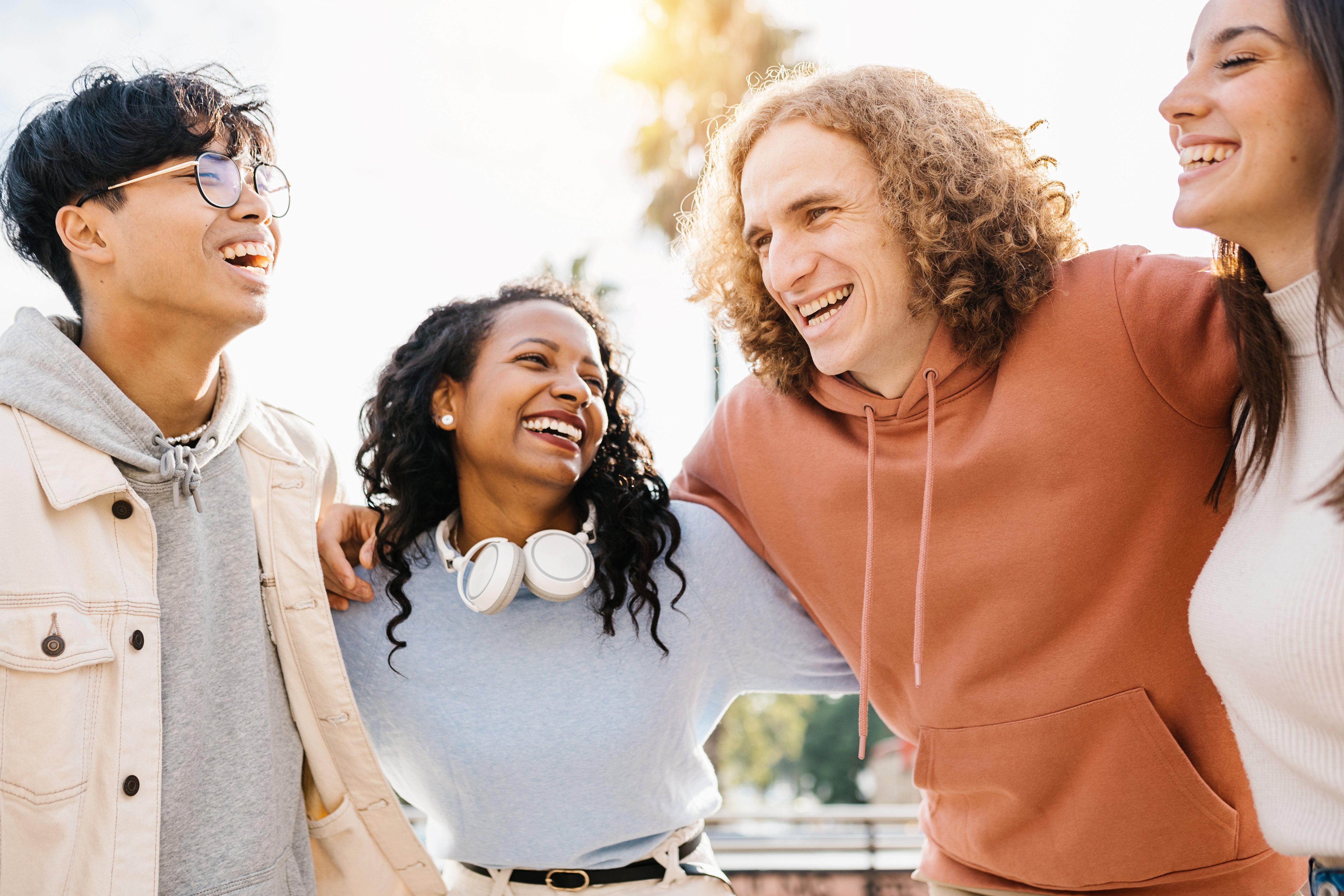 group-of-happy-young-diverse-teenage-friends-laugh-2022-12-09-04-34-29-utc